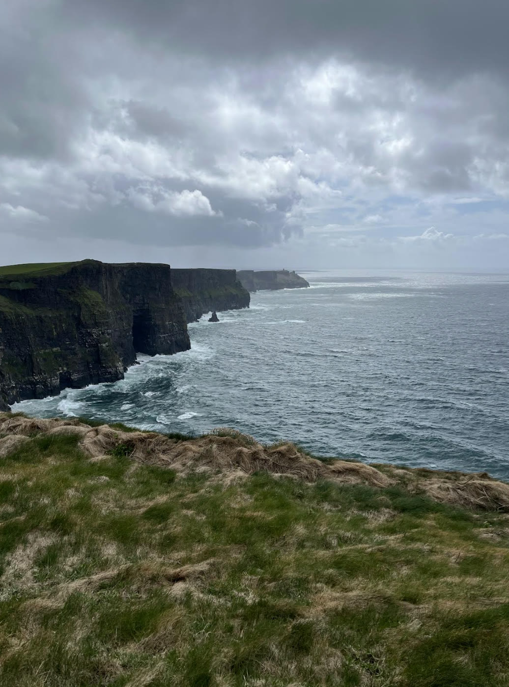 The Cliffs of Moher under stormy skies