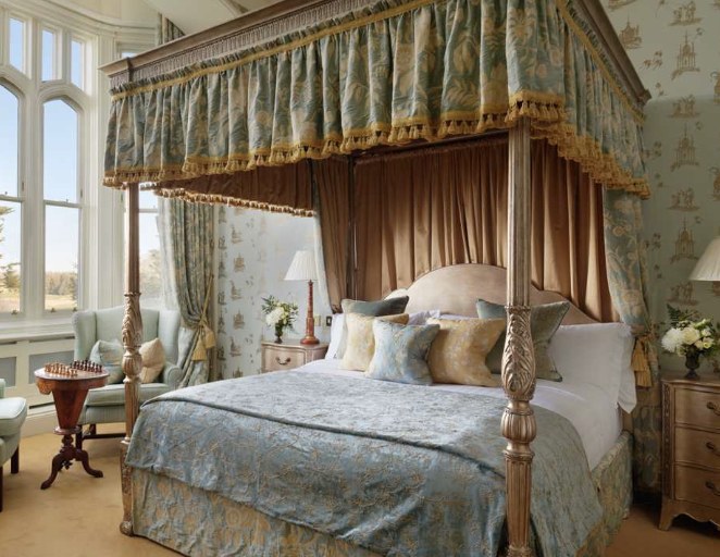 A four-poster guest room at Dromoland Castle