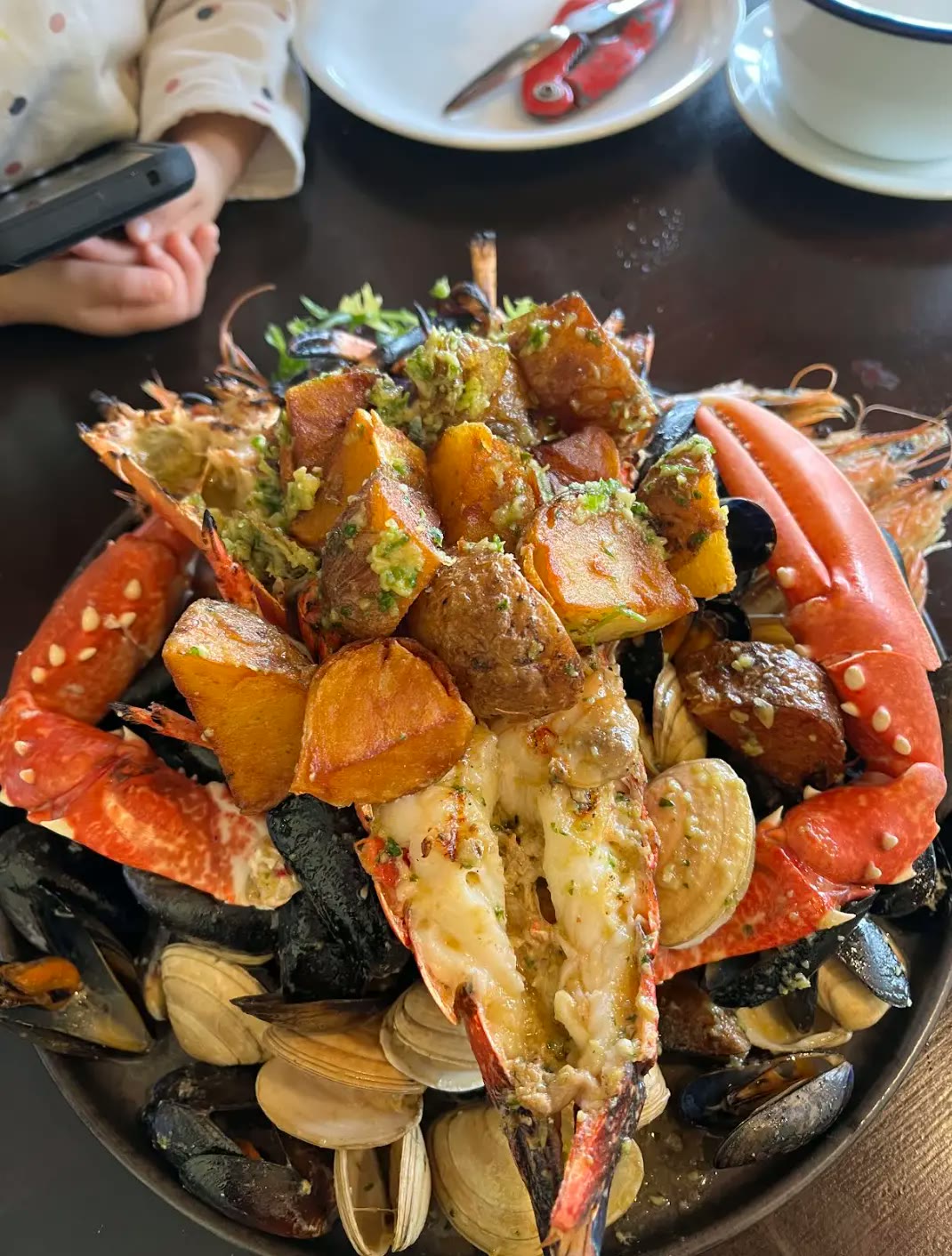 A seafood platter with lobster, mussels and clams